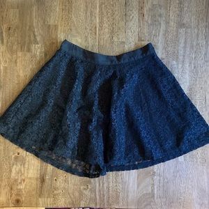 Black lace mini skirt